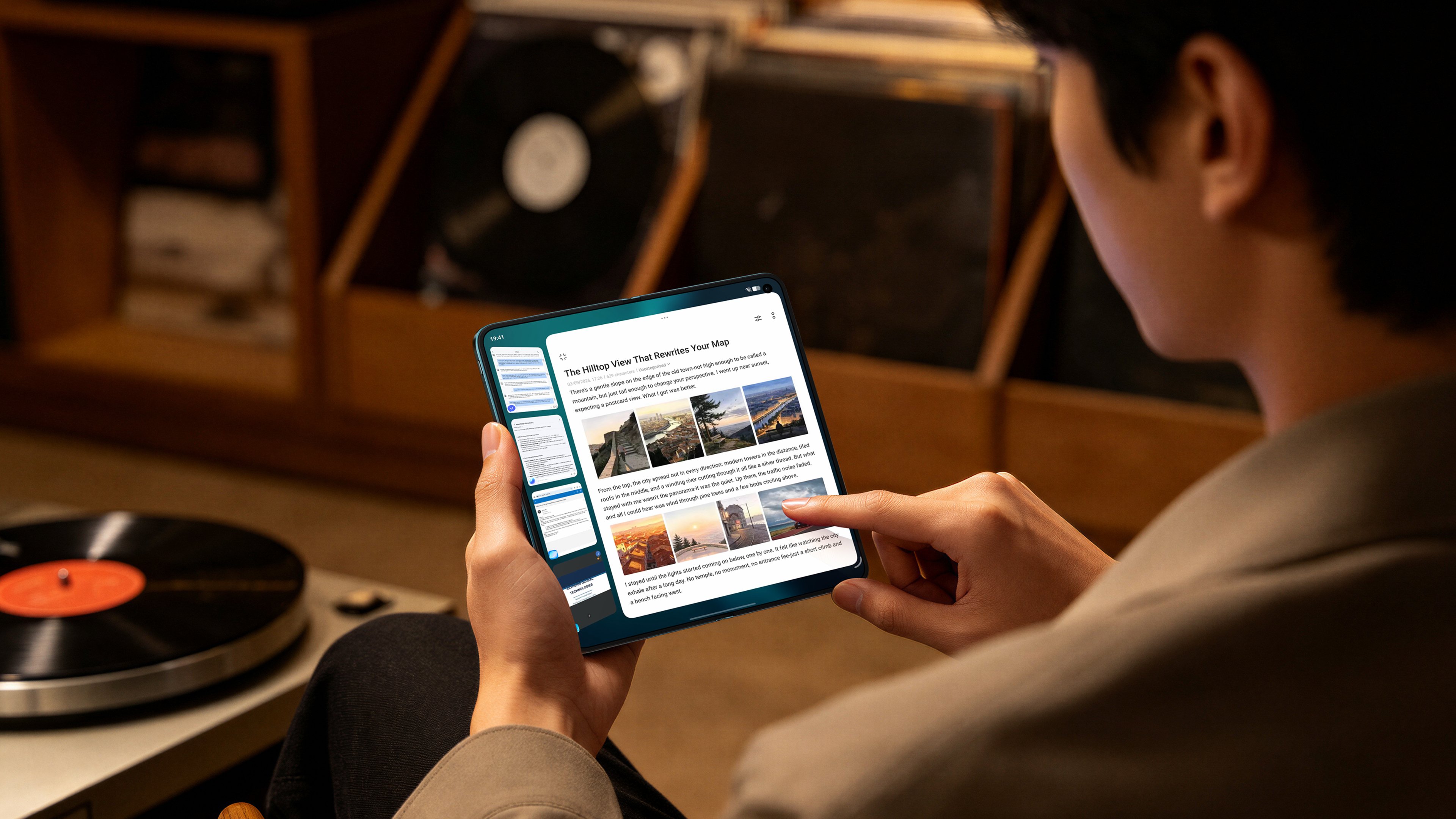 A person holding the Vivo X Fold 6 unfolded in tablet mode, reading an article on its inner display.